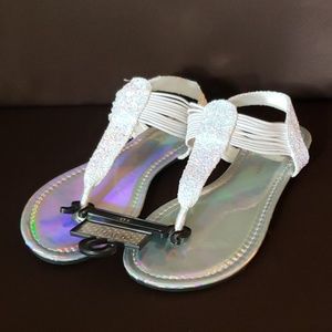 White fluttered sandals